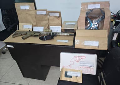 ImagenCatean casa de seguridad, aseguran armas de alto poder