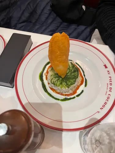 Au Pied de Cochon ¿cuánto cuesta un platillo?