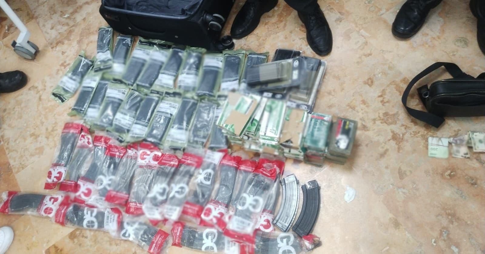 Decomisan arsenal y drogas del CJNG en vuelo privado a Cancún